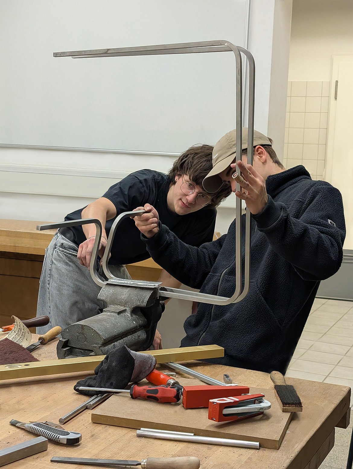 Image of students in the woodworking and model-making workshop