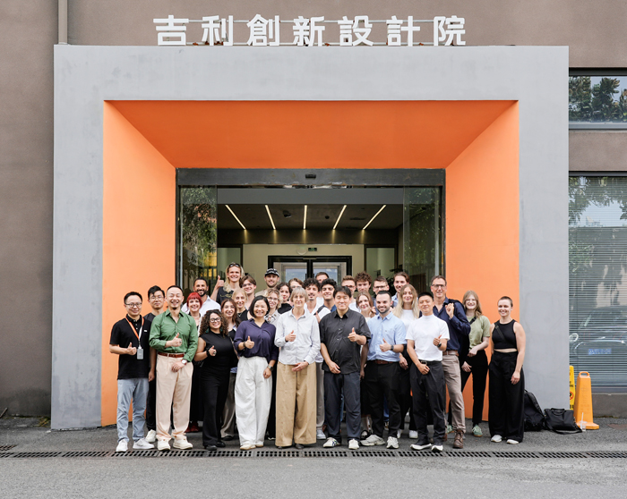 Group photo of the excursion in front of the Geely Design Center in Shanghai.